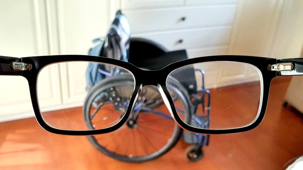 photo of a TNS Notos wheelchair taken through glasses, illustrating wheelchair user versus glasses user